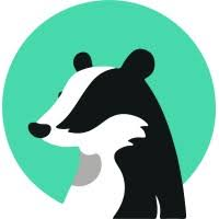 Cartoon badger head in black and white with a pale gray neck, set against a teal circular background.